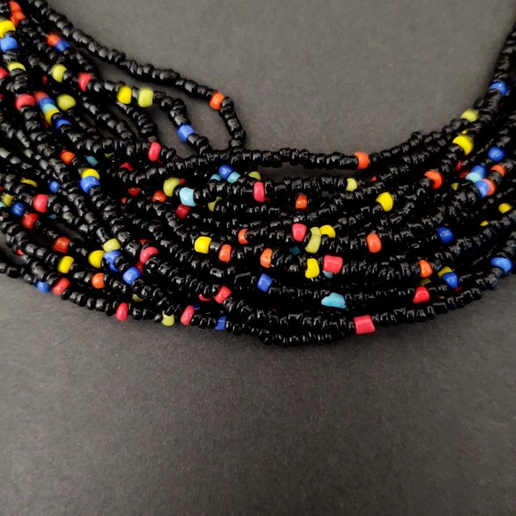 Multi strand black seed bead necklace with bright bead accents - Picture 7 of 13